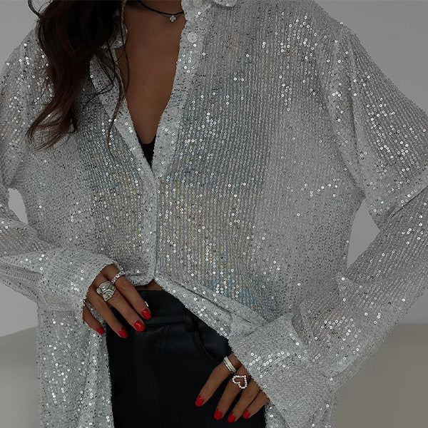 Løs bluse med glitrende palietter – Celeste