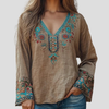 Damebluse med broderi