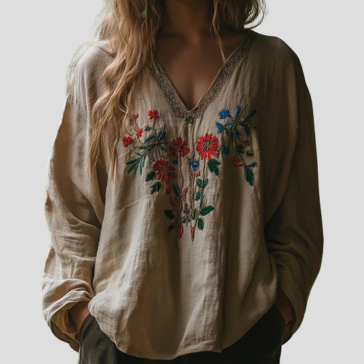 Damebluse med broderi