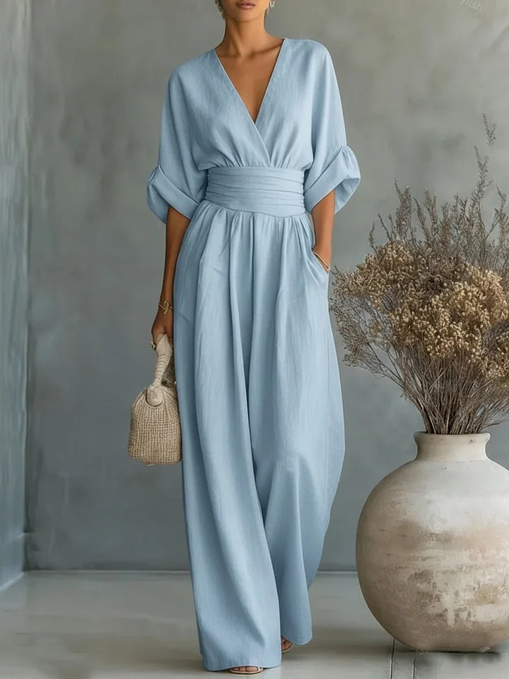 Elegant jumpsuit til kvinder med V-udskæring og vidt bukseben i høj talje