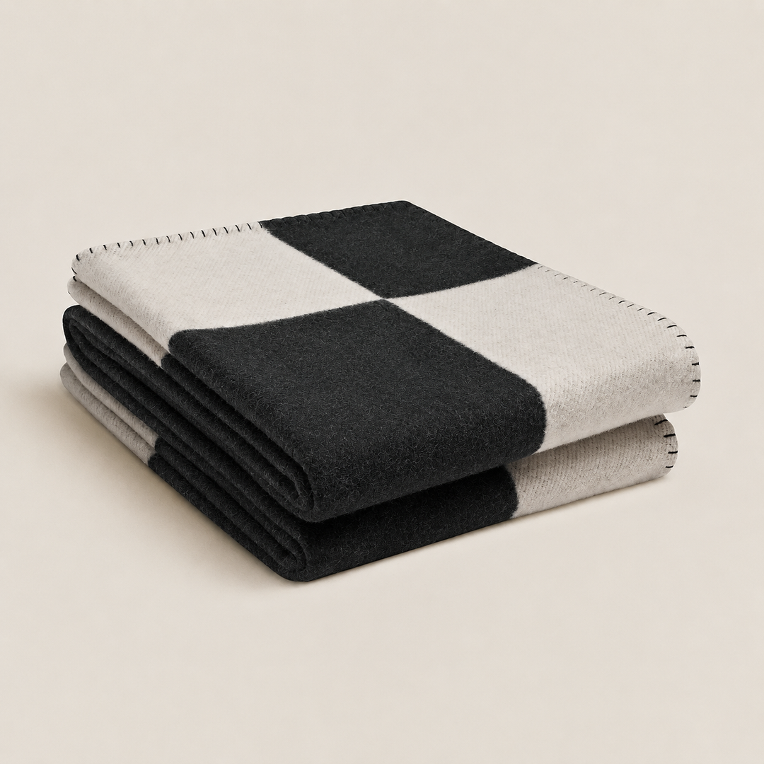 Elegant tæppe i uld og cashmere til et luksuriøst hjem
