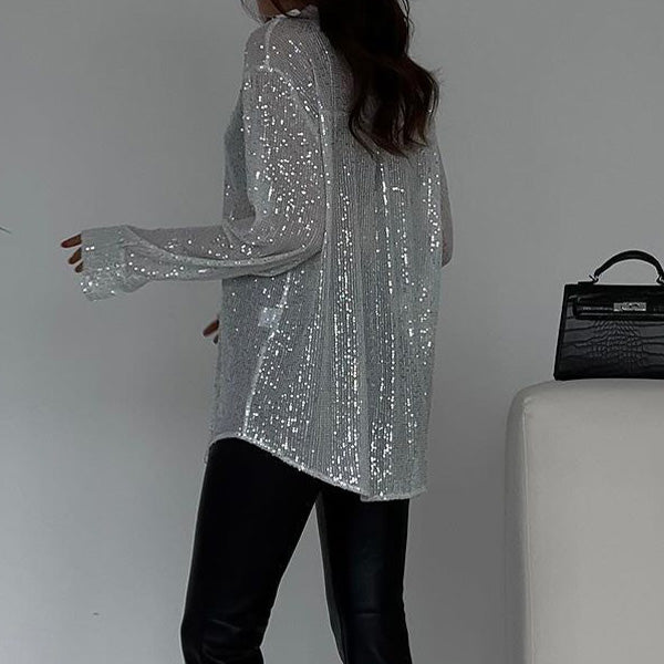 Løs bluse med glitrende palietter – Celeste