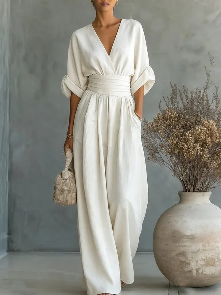Elegant jumpsuit til kvinder med V-udskæring og vidt bukseben i høj talje