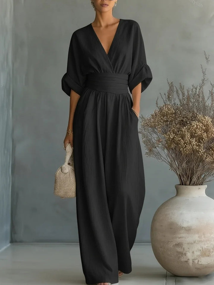 Elegant jumpsuit til kvinder med V-udskæring og vidt bukseben i høj talje