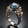 Vintage-ring med safir og bladindlæg