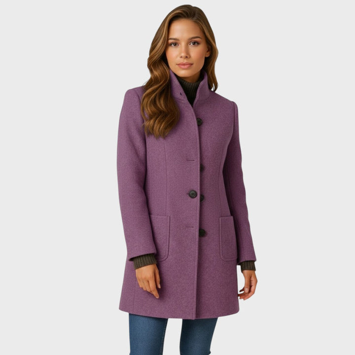 Taljeret damefrakke med knaplukning – elegant stil