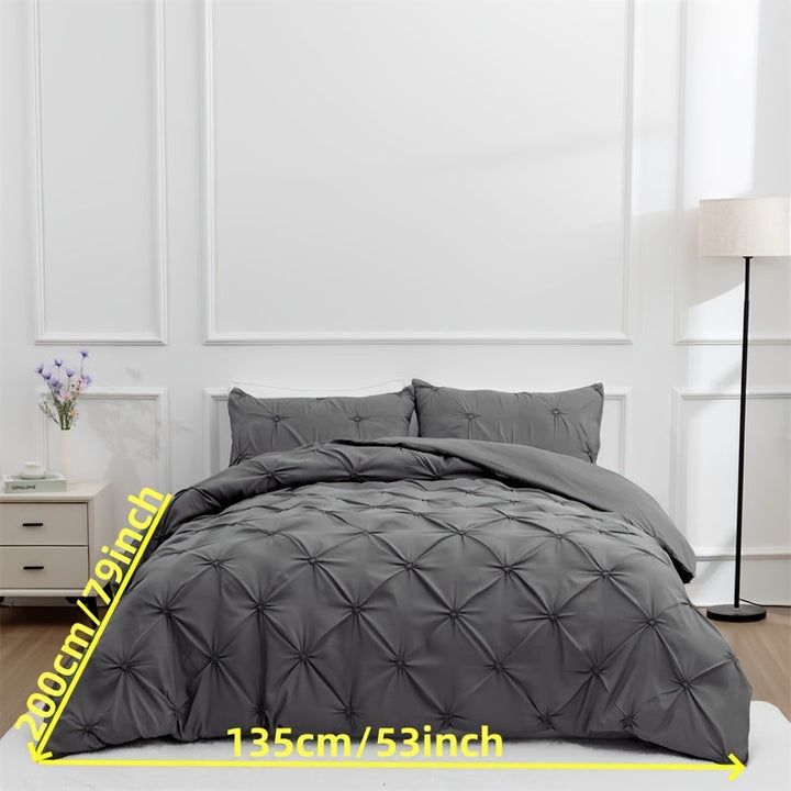 Elegant sengetøjssæt med pintuck-detaljer