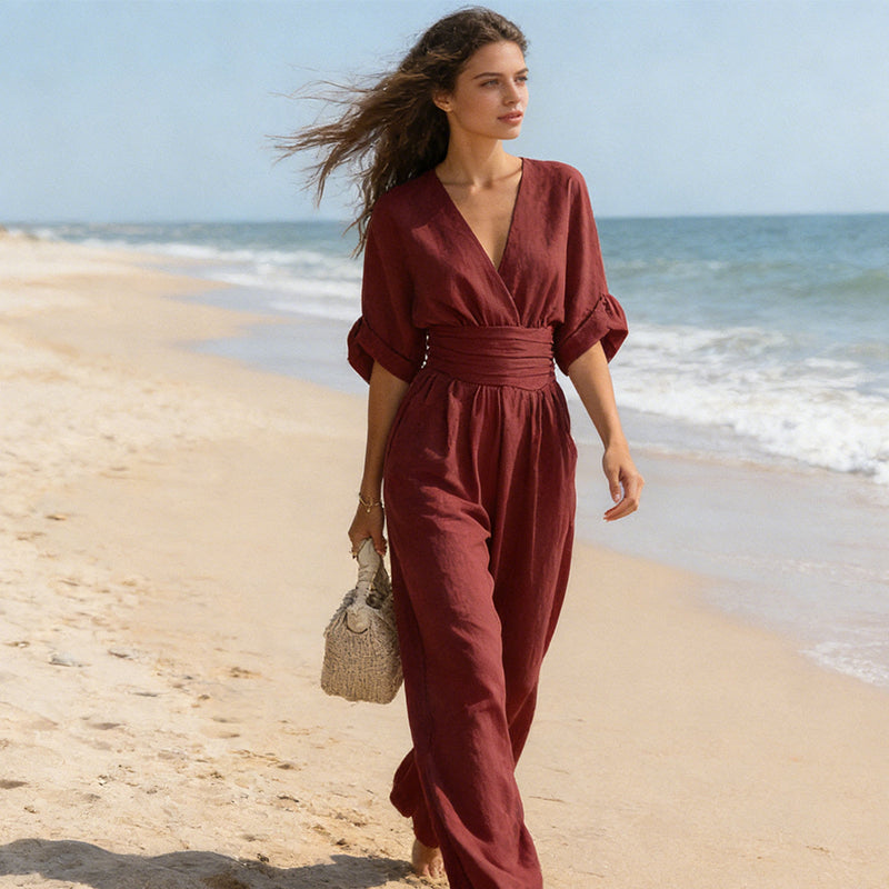 Elegant jumpsuit til kvinder med V-udskæring og vidt bukseben i høj talje