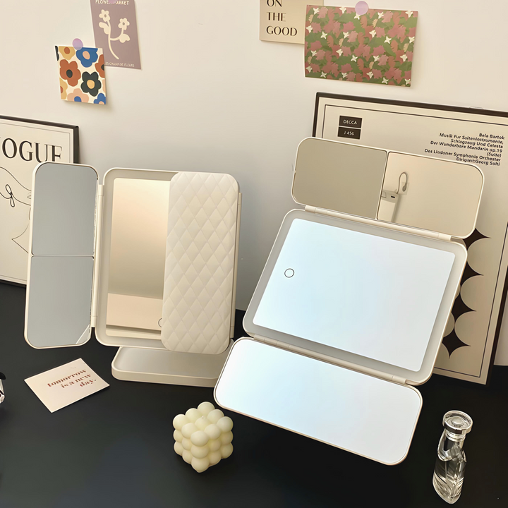 Sammenklappeligt LED-makeupspejl med justerbart lys og pladsbesparende fold