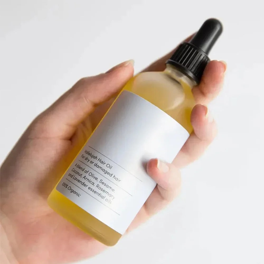 Naturlig rosmarin-hårvækstolie - HerbGlow