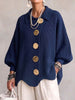 Elegant oversized cardigan med iøjnefaldende knapper