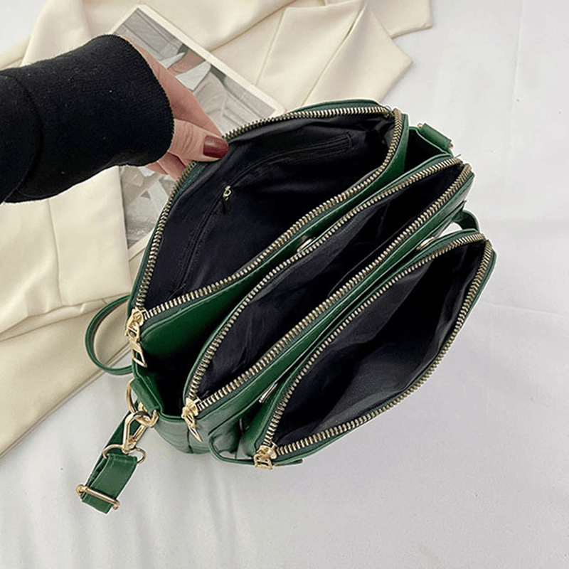 Elegant crossbody-taske i læder - Raffinement & rummelighed