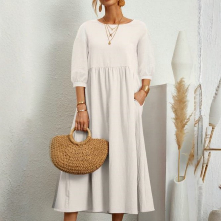Elegant sommerkjole med smock til kvinder