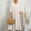 Elegant sommerkjole med smock til kvinder